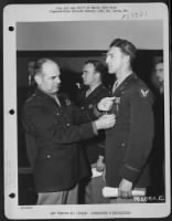 Major General James H. Doolittle Awards The Distinguished Flying Cross To An Officer Of The 90Th Photo Reconnaissance Wing During A Ceremony At An Air Base Somewhere In Italy. - Page 1
