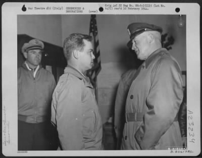 Thumbnail for Consolidated > Gen. Henry H. Arnold, Chief Of The Air Force, Chats With Lt. Colonel Yancey S. Tarrant Of Brownwood, Texas, A Member Of The 64Th Fighter Wing, After Presenting Him With The Distinguished Service Cross During A Ceremony In The Pogmigliano Sector, Italy, On