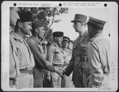 Consolidated > Gen. Charles De Gaulle, Accompanied By Lt. Gen. Ira C. Eaker, Inspecting Sinagalese Troops At The Borgo Airport, Italy.