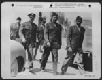 Lt. Gen. Ira C. Eaker, Commanding General Of The Mediterranean Allied Air Forces, Is Shown Here On An Inspection Tour Of The All Negro Fighting Group, With Officers Of That Unit.  Left To Right: Lt. Colonel Beaufort Buchanan, Executive Officer Of A Fighte - Page 9