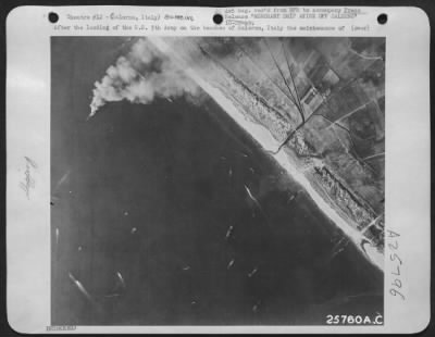 Thumbnail for Consolidated > After the landing of the U.S. 5th Army on the beaches of Salerno, Italy the maintenance of supplies was a vital problem. This picture, made on Sept. 16, shows numerous barges landing additional supplies for the American forces. The scene is the Bay