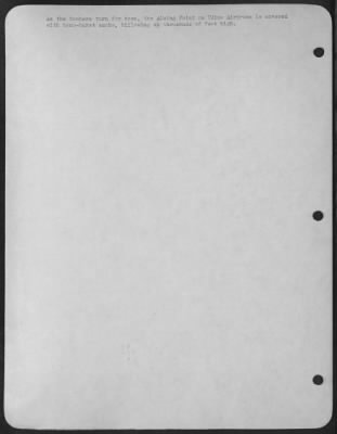 Consolidated > As the bombers turn for home, the Aiming Point on Udine Airdrome is covered with bomb-burst smoke, billowing up thousands of feet high.