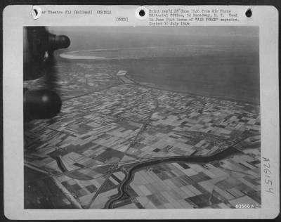 Consolidated > An air view of the peaceful Netherlands from 10,000 feet up, reveals none of the scars of the bitter struggle that raged little more than a year ago. This particular shot was taken while flying over the famous body of water known as the Zuider Zee.