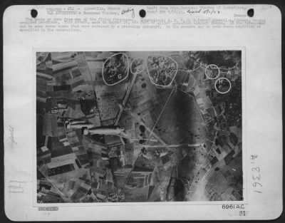 Thumbnail for Abbeville > No. 1 The bombs go down from one of the Flying Fortresses. Annotations: A. Bombs bursting in the North dispersal area. C. Bursts on the northern end of the N.E.-S.W. runway. F. Burst on flak position-the battery is of light A.A. character. G. Bursts