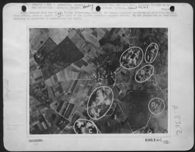 Thumbnail for Abbeville > No. 2. Taken after No. 1. Annotations: A. Bombs bursting in the north dispersal area. C. Bursts on the northern end of the N.E.-S.W. runway. F. Burst on flak position-the battery is of light A.A. character. G. Bursts on light flak position. H. Bursts