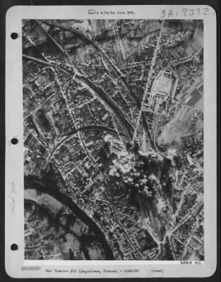 Thumbnail for Angouleme > First concentrations of bombs strike the rail marshalling yards at Angouleme, in northern France as U.S. 8th AAF heavies attacked on 15 June 44.