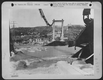 Thumbnail for Arles > THIS WAS THE BRIDGE AT ARLES, FRANCE-Broken by the bombs of Allied planes, twisted by the current of the Rhone, this bridge at Arles is another that the Nazi could not use to escape the noose of "Operation Strangle."