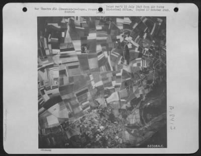 Thumbnail for Consolidated > Camouflaged airdrome at Beaumont-le-Roger, France, under bombardment from Allied planes. 28 June 1944.