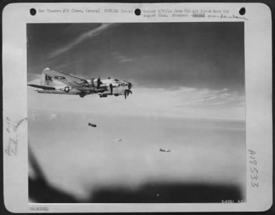 Thumbnail for Caen > Boeing B-17 Flying Fortresses carry out troop support operations south of Caen, France. The Forts used bombs on wing racks in bombing enemy troops.