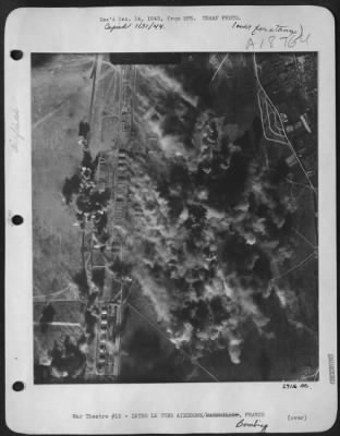 Thumbnail for Istres-Le-Tube > Smoke and dust billow upward during successful attack by Flying Fortresses of the 15th Air Force on Istre Le Tube airdrome near Marseilles, France, on Nov. 16. (USAAF PHOTO)