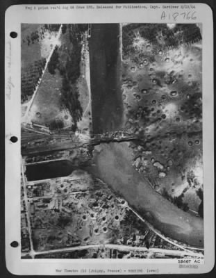 Thumbnail for Joigny > At Joigny, France about 80 miles SE of Paris, the main bridge can be observed after direct  hits had severed it in many places, putting it out of service temporarily. This was the result of the 8th Air Force bomber attack there on 10 Aug 44.