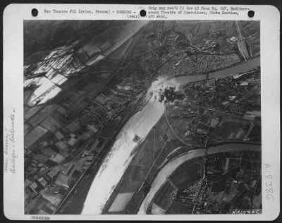 Thumbnail for Arles > A Long Range View Of The Target From A Martin B-26 Marauder As It Banked Away Turning Into The Stretch Home.  The Railroad Bridge Across The Rhone River, Arles, France, Had Been Completely Covered By The First Wave Of "Marauders" To Attack It.