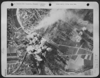 Thumbnail for Auxerre > Target Covered Area -- Smoke Covers The Bridge Area At Auxerre Near Dijon, France As 8Th Usaaf Heavy Bomber Struck At Nazi Communications East Of Paris On 25 June 44.