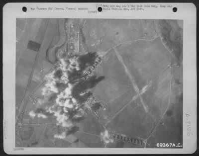 Thumbnail for Avord > Smoke Rises From Exploding Bombs Which Have Hit Their Targets On An Enemy Airdrome In Avord, France, During A Bombing Raid By Usaf Bombers On 5 Feb 1944.