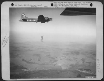 Croisette > A Row Of Bombs Dropped By Boeing B-17 Flying Fortresses Of The 91St Bomb Group, 8Th Air Force, Falls Toward The Target At Croisette, France.  14 January 1944.  (Altitude 12,000 Feet).