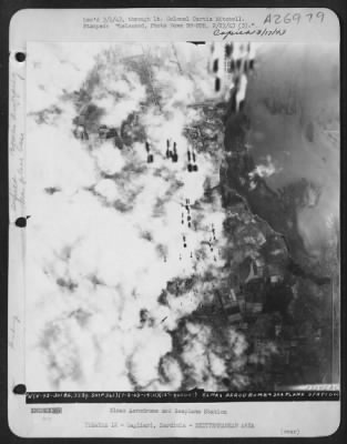 Thumbnail for Consolidated > The U.S. Army's Air Force dealt a heavy blow in early February, 1943, to the airdrome and seaplane base at Cagliari, Sardinia. Striking in broad daylight, Flying Fortresses and Martin Marauder bombers showered the Axis fields with high explosive and