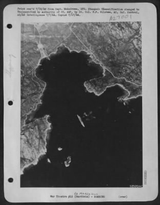 Thumbnail for Consolidated > Part of La Maddalena under attack by Northwest African Air Forces Boeing B-17 Flying Fortresses. Note torpedo booms protecting Italian Cruiser at anchor in center.