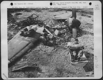 Thumbnail for Consolidated > #3 AFHQ. Aug. 10, 1943--Solid comfort for Yank. Sgt. Albert J. Stewart of New York City. Sgt. Albert J. Stewart of New York City finds good use for smashed Axis airplanes at a Sicilian Airport recently captured by American forces. Direct hits by