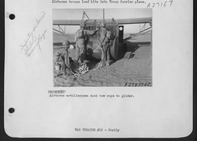 Thumbnail for Consolidated > Airborne artillerymen hook tow rope to glider.