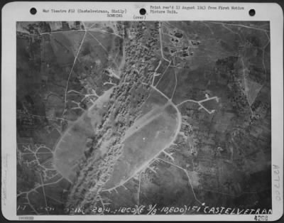 Thumbnail for Consolidated > Bombs explode on an airfield near Castelvetrano, Sicily.