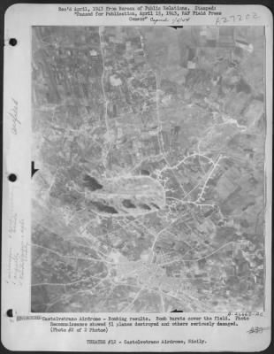 Thumbnail for Consolidated > Castelvetrano Airdrome-Bombing results. Bomb bursts cover the field. Photo Reconnaissance showed 51 planes destroyed and others seriously damaged.