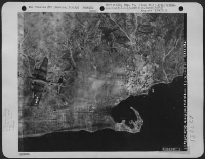 Thumbnail for Consolidated > A Boeing B-17 Flying Fortress of the 97th Bomb Group, 414th Bomb Squadron, 15th Air Force leaves its target at Messina, Sicily covered with bomb bursts on 8 May 1943.