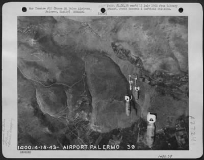 Thumbnail for Consolidated > Bombs drop on Bocca Di Falco Airdrome, Palermo, Sicily, on 18 April 1943.