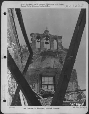 Thumbnail for Consolidated > Although bombing attacks have virtually demolished this church near the waterfront in Palermo, Sicily, two of the bells hanging in the tower are still intact. July 1943.