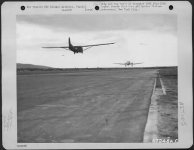 Thumbnail for Consolidated > A Waco Cg-4 Glider, Towed By A Douglas C-47, Is Airborne Over The Runway At Comiso Airfield, Sicily, 1943.  During The Maneuvers Of The 52Nd Troop Carrier Wing, The Glider Will Be Released Over Ponte Olivo Airfield, And The Paratroopers Will Jump.