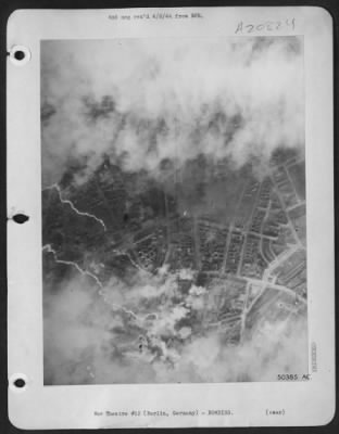 Thumbnail for Consolidated > Wedding District of Reich capital--Although visibility was poor, cloud formations parted long enough for the camera to record hits on the Wedding District of Berlin, just north of the famous Tiergarten during an all-out attack by U.S. 8th AF