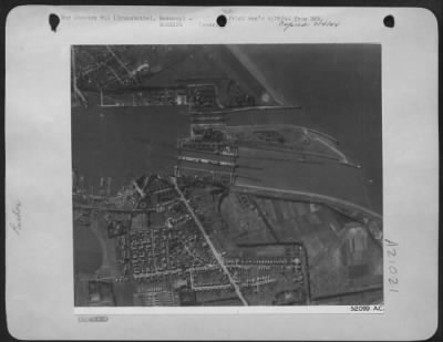 Thumbnail for Consolidated > BEFORE THE ATTACK--The dock area at Brunsbuttel in Northern Germany is shown here a few minutes before the U.S. Eighth AF heavy bombers dropped heavy concentrations there 18 June 44.