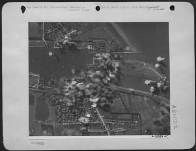 Thumbnail for Consolidated > BRUNSBUTTEL ON THE ELBE--U.S. Eighth AAF heavies returned 18 June 44 to bombing targets deep in Germany when they attacked Hamburg and Brunsbuttle, both traffic centers on the Elbe. Here heavy concentrations burst in the dock area at