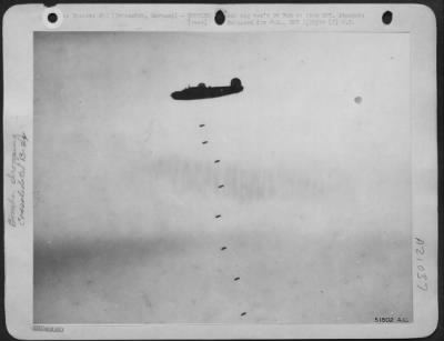 Thumbnail for Consolidated > "Bombs Away" over Brunswick--U.S. 8th AAF heavy bombers, flying deep into Germany again 20 Jan 44 attack vital war industries at Brunswick and Hanover despite heavy clouds which made formation flying difficult. The great air battle-attack was