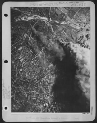 Thumbnail for Consolidated > FOUR FACTORIES AND AIRFIELD HIT: Consolidated B-24 Liberators of the 8th AAF pay an Easter Saturday visit to the Brunswick area and while there, blasted the nearby airfield (top) the Wilke-Werke AG engineering works and the Wilhelmitor ME-110