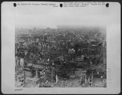 Consolidated > Fires were still burning in the city of Cologne, when a 9th AF photographer entered the historic Rhine river city with the first contingent of U.S. First Army troops to take this picture. Cologne was repeatedly bombed by the 8th AF and the RAF before