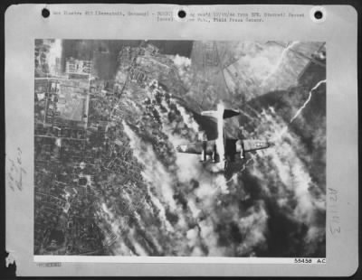 Thumbnail for Consolidated > One of the 1250 heavy bombers sent over Germany 12/12/44 by the U.S. 8th Air Force, the Boeing B-17 Flying Fortress soars over the heavily bombed Darmstadt marshalling yards during a U.S. 8th Air Force attack on Nazi traffic centers supplying the