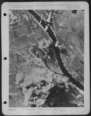 Thumbnail for Consolidated > One bomber of the second wave of attacking Boeing B-17 Flying Fortresses, soars over the inferno of smoke surging upward from the German underground oil storage depot at Derben, 14 January 1945, as second wave of U.S. 8th Air Force heavies close in