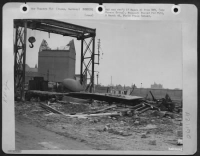 Thumbnail for Consolidated > Ninth Air Force fighter-bombers, flying ahead of the First Army thrust to Cologne, knocked out this loading platform in the railroad yard at Duren, Germany. In the early days of this offensive, Republic P-47 Thunderbolts of the 9th's three tactical