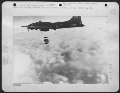 Thumbnail for Consolidated > Boeing B-17, "Flying Fortress" drops salvo of bombs over Emden, Germany-October 2, 1943.