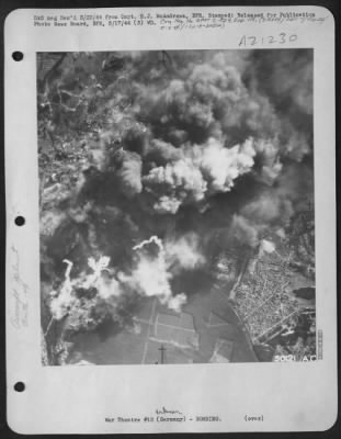 Thumbnail for Consolidated > BERLIN INFERNO--Shops and warehouses of the VKF aircraft bearing plant belched fire and smoke skyward as Flying Fortresses and Liberators of the US Eighth Air Force paid their third visit to the Reich capital in five days on Wednesday. Located at