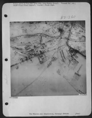 Thumbnail for Consolidated > The oft-bombed road and rail facilities at Euskirchen, Germany have received further damage in this photo taken Jan. 30, 1945. Six new craters have cut the only remaining through lines immediately west of the railroad bridge. The single track line