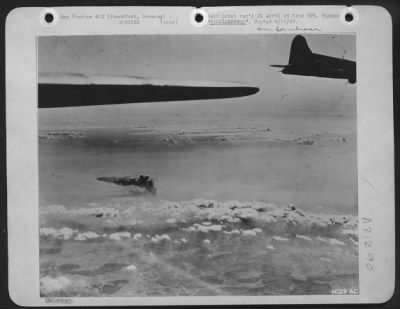 Consolidated > FRANKFURT BELOW: --Two of the U.S. Army 8th AF Flying Fortresses can be seen flying from scene after having deposited their eggs on a military objective. The bombs had to fight their way through opposition by fighters and flak defenses. From the