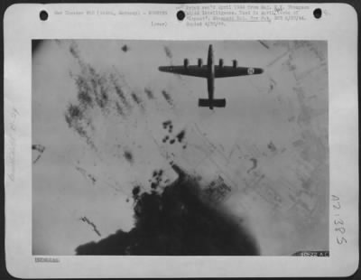 Thumbnail for Consolidated > German Air Force Fighter production tumbles-Plane is Consolidated B-24 Liberator leaving Gotha, Germany on 24 Feb 1944.