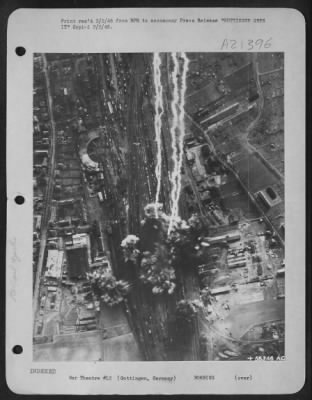 Thumbnail for Consolidated > GOTTINGEN GETS IT--Erupting bombs spray destruction in their path as they strike with pin-point accuracy at the heart of the rail marshalling yards at Gottingen, Germany. This is part of the huge daylight assault of Nazi communications by U.S. Army