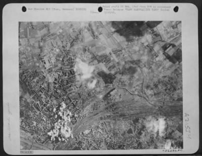 Consolidated > The huge marshalling yards at Hamm, germany, are attacked by the U.S. Army 8th AF 3rd Air Divison. The first concentration of bombs from B-17 Flying Fortresses is beginning to spread across the "choke" point where the tracks narrow to cross the