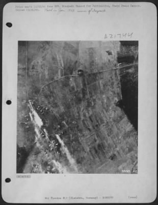 Consolidated > Flame and smoke spurt skyward from the village of Kleinhau, Germany after 9th Air Force P-38 Lightning fighter-bombers attacked the area recently. Because this sector constituted an important barrier in the path of U.S. ground forces, Maj. Gen. E.R.