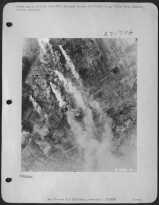 Consolidated > Flame and smoke spurt skyward from the village of Kleinhau, Germany after 9th Air Force P-38 Lightning fighter-bombers attacked the area recently. Because this sector constituted an important barrier in the path of U.S. ground forces, Maj. Gen. E.R.