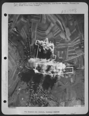 Thumbnail for Consolidated > German rail yard and supply depot at Lebach, 12 miles north of Saarbrucken, Germany during bombing by First Tactical AF Martin B-26 Marauders. In the supply depot, marked out on top, three warehouses were hit and two others damaged by near misses. In