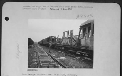 Thumbnail for Consolidated > Bomb Damaged Railroad Cars At Cologne, Germany.