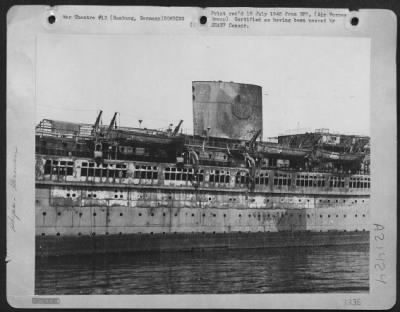 Consolidated > Hamburg Germany -- Namesake Of Robert Ley, The Nazi Labor Camp Front Leader Now A Prisoner Of The Allied Armies, Is The 28,000-Ton Liner Built In 1938 For The 'Strength Through Joy' Movement Cruises.  It Was Gutted By Fire As A Result Of One Of The Attack